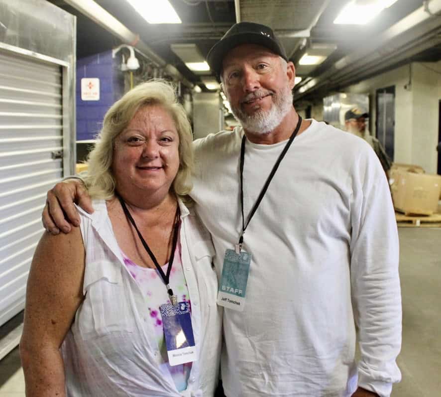man woman embrace for picture so cal harvest 2019 heart to serve blog